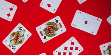 free-photo-of-photograph-of-playing-cards-on-a-red-surface
