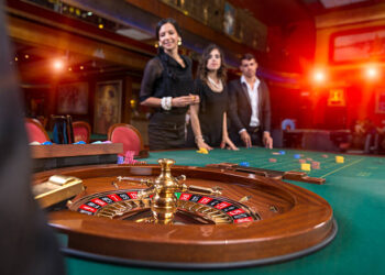 Group of young people playing roulette
